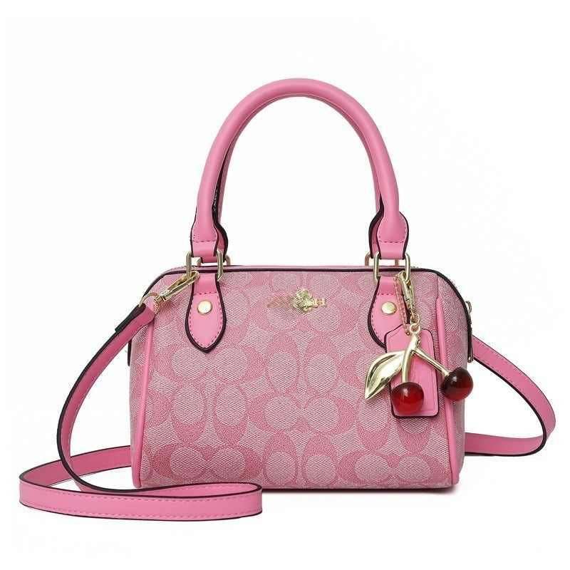 Mini Rowan Crossbody Bag In Signature Canvas